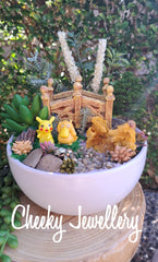 Pikachu and Pyduck pokemon inspired themescapes gardens with Crystal. Imagination play.
Pretend play, decor, and collectables. (Copy)