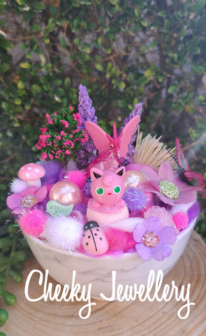 Jiggly Puff and Venomoth pokemon inspired themescapes gardens with Crystal. Imagination play.
Pretend play, decor, and collectables.