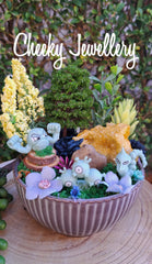 Geodude, Onix and Magneton pokemon inspired themescapes gardens, with Crystal. Imagination play.
Pretend play, decor, collectables.