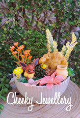 Eevee pokemon inspired themescapes gardens with Crystal. Imagination play.
Pretend play, decor, and collectables.