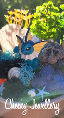 Vaporeon and Lapras pokemon inspired under water themescapes gardens Imagination play.
Pretend play, decor, and collectables.