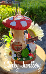 Handcraft Mushroom toadstool gnome home using recycled items and airdry clay.